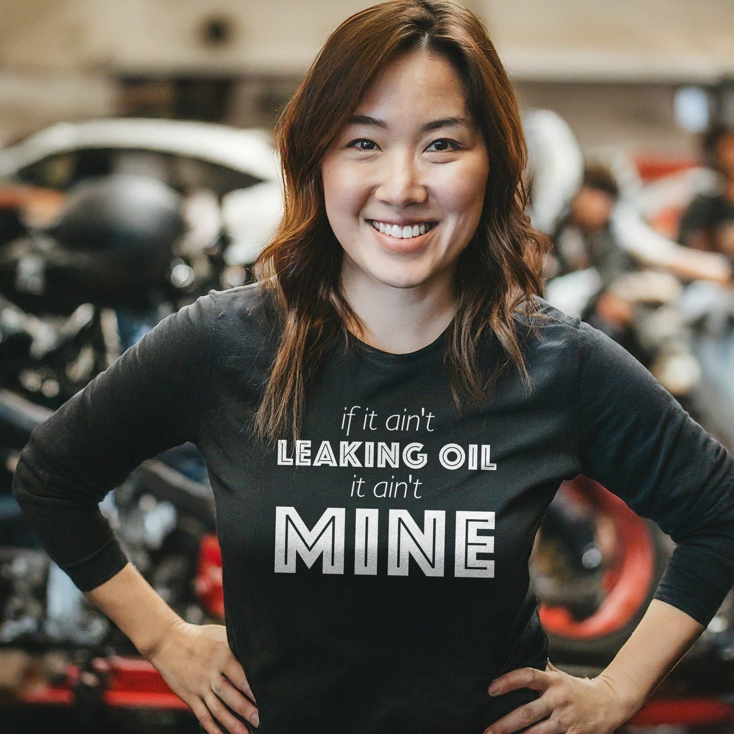If It Ain't Leaking Oil It Ain't Mine Unisex Long Sleeve Tee